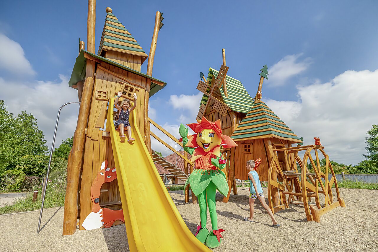 Themed playground, slide, mascot at CLICOCHIC Village des Meuniers campsite in Dompierre-les-Ormes (71).