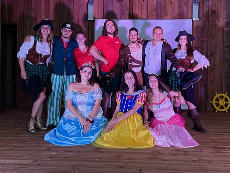 Entertainment team dressed as pirates and princesses on stage at CAPFUN Le Village Parisien campsite in VARREDDES (77).