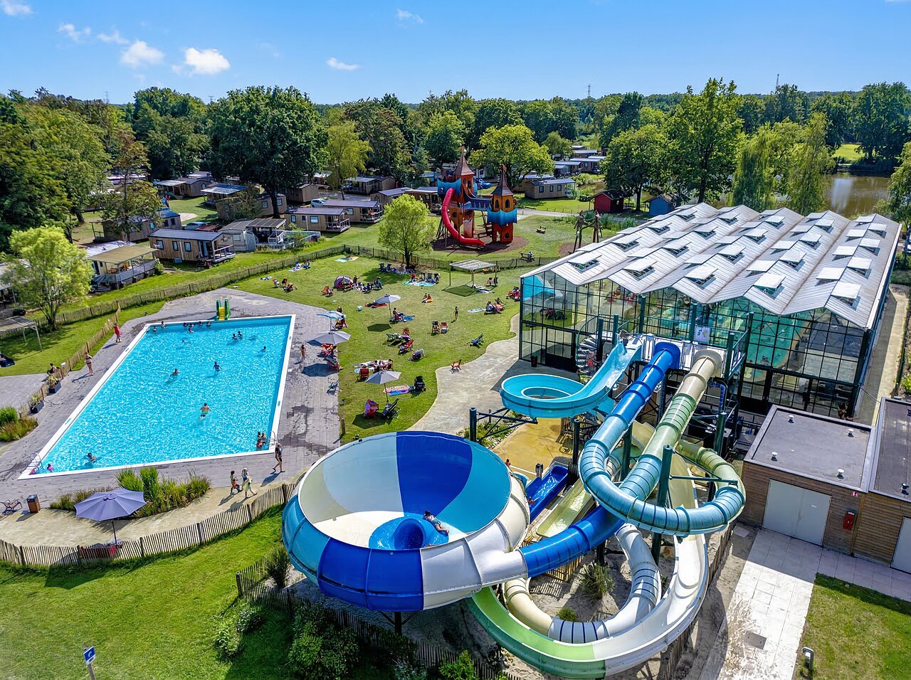 Water park, outdoor pool and Mobile homes at CAPFUN Vlinderloo campsite in Enschede.