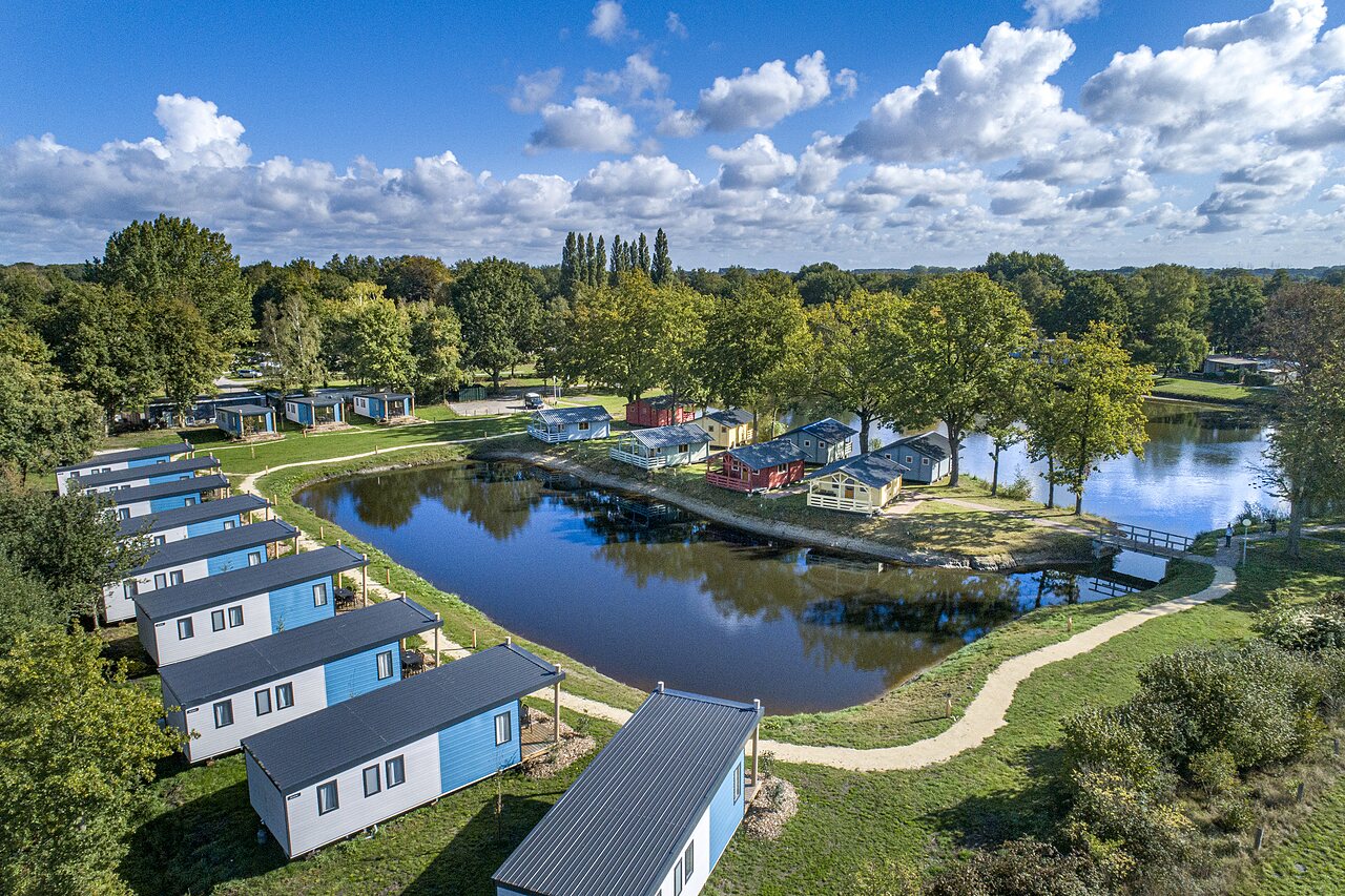 Aerial view of modern Mobile-homes by a pond, at CAPFUN Vlinderloo campsite in Enschede.