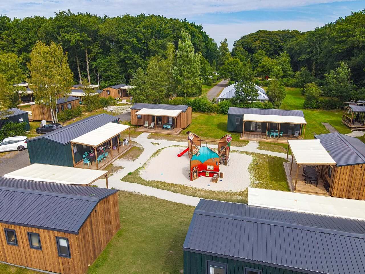 Mobil-homes and playground, aerial view at CAPFUN De Waldsang campsite in Bakkeveen.