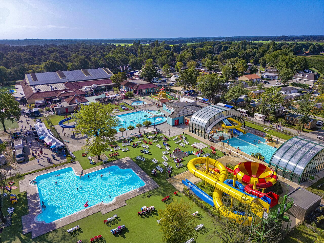 Aerial view of water park with giant slides at CAPFUN Wondermolen campsite in Molenschot.