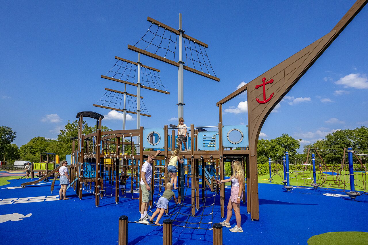 Large pirate ship themed playground at CAPFUN de Wondermolen campsite in Molenschot.