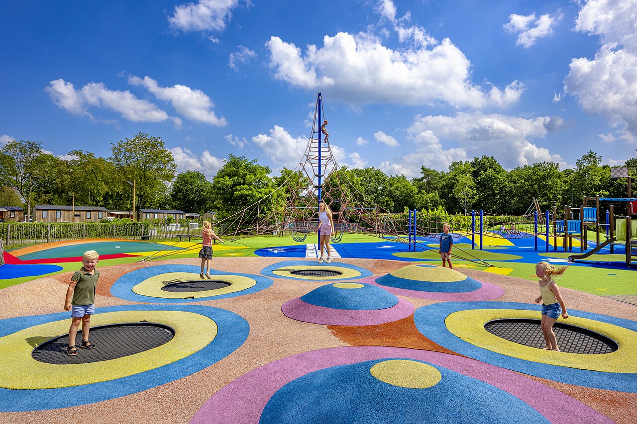 Trampolines and climbing structure for children at CAPFUN Wondermolen Molenschot campsite.