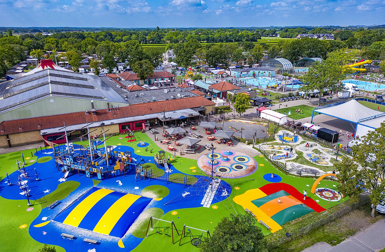 Large playground, swimming pool and slides at CAPFUN Wondermolen campsite in Molenschot.