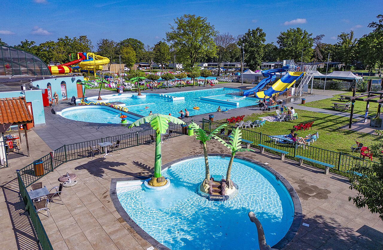 Water park, slides and outdoor pools at CAPFUN de Wondermolen campsite in Molenschot.
