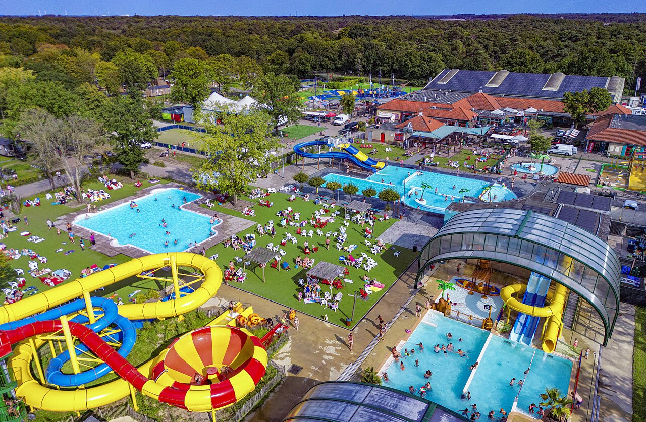 Aerial view of water park with slides and pools at CAPFUN Wondermolen campsite in Molenschot.