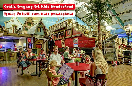 Indoor pirate-themed restaurant with families at CAPFUN de Wondermolen campsite.